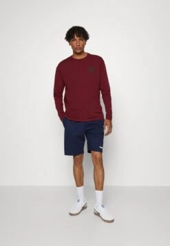 Hummel BoxyMaglietta A Manica LungaCabernet Uomo Abbigliamento HU342D0GB-G11 -Montavia Avventura Negozio 3afdaa8852734411bade15dd4e29fc2e