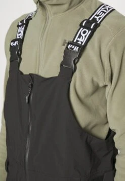 Oakley Shell BibPantaloni Da SnowboardBlackout Uomo Abbigliamento OA342E01B-Q11 13 Oakley Shell BibPantaloni Da SnowboardBlackout Uomo Abbigliamento OA342E01B-Q11 -Montavia Avventura Negozio 5881f8e340324490a6ba97ed3b6bf4a6