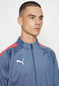 Puma Teamliga TracksuitTutaInky Blue/Fire Orchid Uomo Abbigliamento PU142K02M-K13 -Montavia Avventura Negozio 804c1035f0da4d91b026fe3ccb51453a