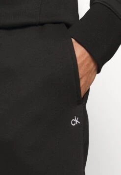 Planet Sports SuitTutaBlack Uomo Abbigliamento CK442G00Q-Q11 -Montavia Avventura Negozio dc3dff4d94db4b388accdb4e48cae3f8