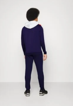 Puma Hooded Colorblock Suit SetTutaPeacoat Uomo Abbigliamento PU142K02H-K11 -Montavia Avventura Negozio ec321c5aada743e68f3a8a07e1067aec